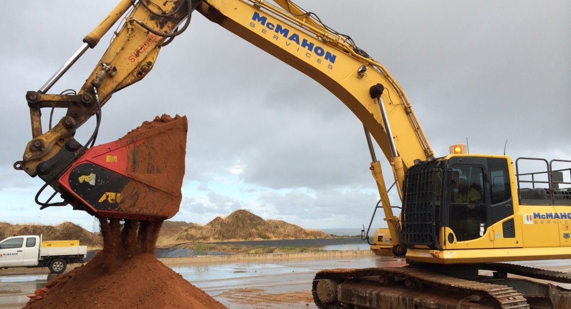 McMahon Biorem of TPH contaminated soil allubucket attachment