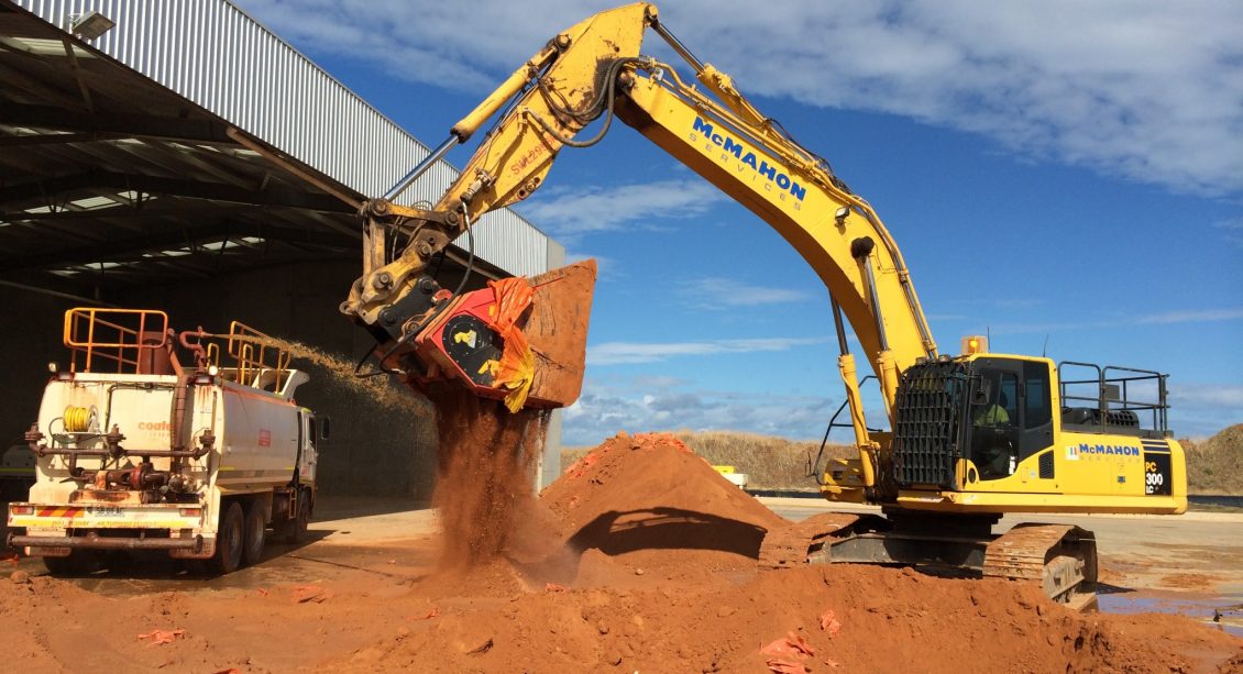 McMahon Biorem of TPH contaminated soil allubucket attachment