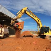McMahon Biorem of TPH contaminated soil allubucket attachment