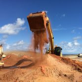 McMahon Biorem of TPH contaminated soil allubucket attachment
