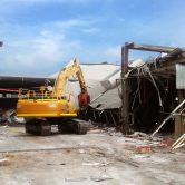 yellow crane demolition site