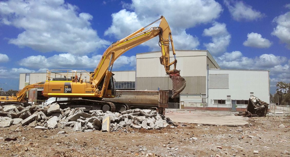 yellow crane demolition site