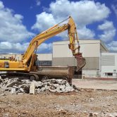 yellow crane demolition site
