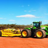 Tractor - scraper system
