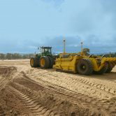 Tractor - scraper system
